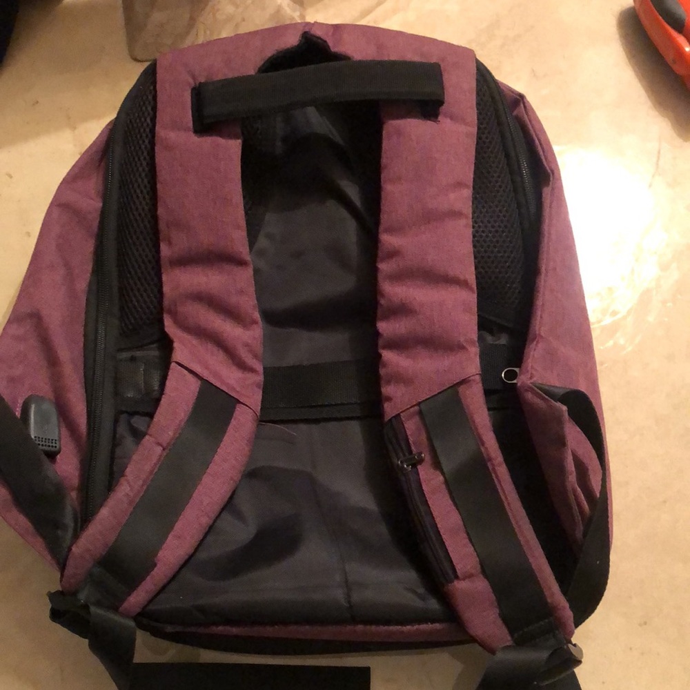 Security Travel backpack. No pockets on exterior. All pockets/storage on inside